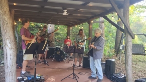 Maureen jamming at Guitar Lessons Ithaca student party 2024