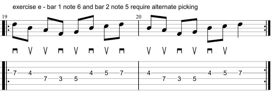 example of directional picking in standard notation and tablature
